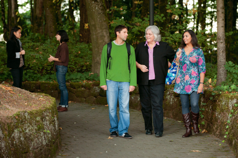 Teresa McDowell (center), professor and chair of counseling psychology