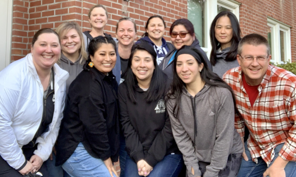 The 2023 part-time elementary MAT cohort. Left to right, front: Kathryn Webster, Sirenia Gonzalez, Gloria Oliva, Brenda Garzon, Greg Swet...