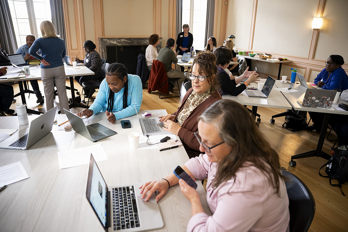 School and district leaders attend one of the principal redesign workshops