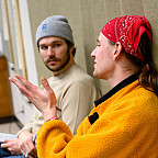 Two students talking with each other.