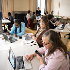 School and district leaders attend one of the principal redesign workshops