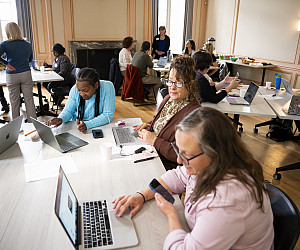 School and district leaders attend one of the principal redesign workshops